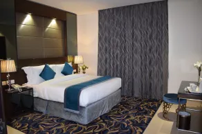 Omega Hotel Dubai - Chambre