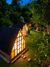 Cave Ritz Coorg by VOYE HOMES - A Frame Cottages in Plantation - Pet Friendly - Jardines del alojamiento