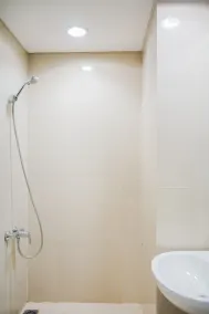 Compact and Cozy Studio Atria Residence Gading Serpong Apartment By Travelio - Bathroom