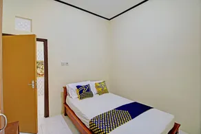 Hotel O Delia Inn Syariah - Chambre