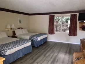 Four Seasons Inn - Zimmer