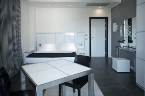 Atmosphere Suite Hotel - Zimmer