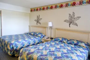 Dave's Locations de vacances - Palms resort - Chambre