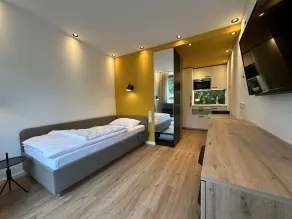 FIDSCHI'S Apartment + Hotel - Room