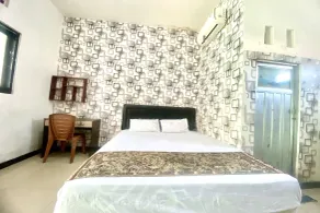 Capital O 93829 Alika Homestay Syariah - Room