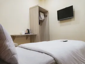 Hotel Nusantara Indah Syariah - Værelse