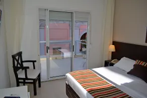 De la Plaza Hotel - Zimmer