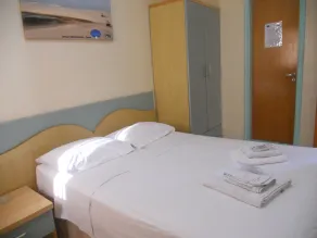 Condomínio Flat La Perla - Habitación