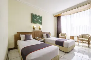 Super OYO Collection O 25 Hotel Baltika - Habitación