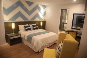 Bryan Condominium Suites - Chambre