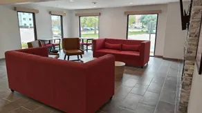 Hawthorn Extended Stay by Wyndham DFW Airport North - Coin salon dans le hall