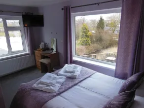 Y Giler Arms - Habitación