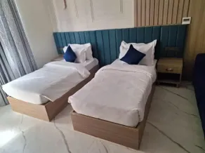 Shree Aaradhya Suites - Zimmer