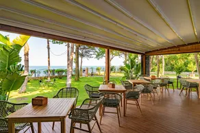 Epico Seafront & Garden Apartments - Restaurant