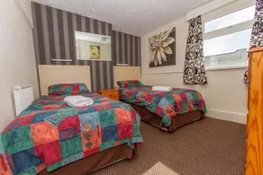 New Promenade Hotel - Chambre