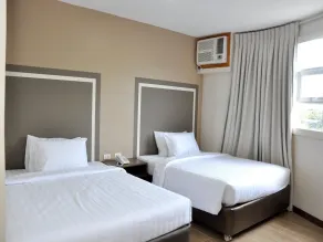Capital O 911 S Hotel And Residences - Zimmer