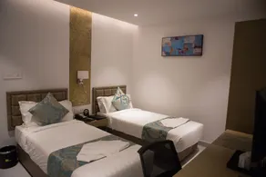 Vihaari 24 Business Hotel - Room