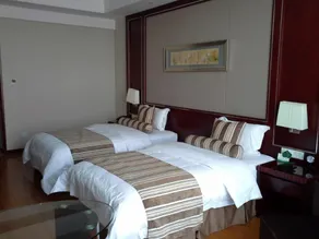 Qingdao Huaxi Hotel - Zimmer