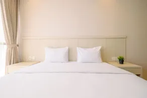 Spacious and Warm 2BR at Ciputra World 2 Apartment By Travelio - Zimmer