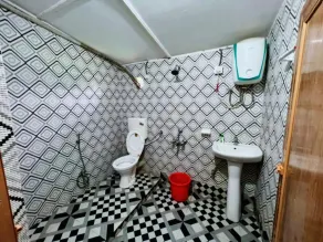 Goroomgo Green Gold Resort Lataguri - Baño