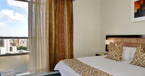 The Parktonian All Suite Hotel - Room