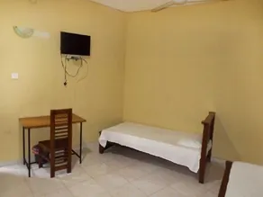 Omega Hotel & Motel - Quarto