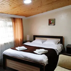 Manoni Ratiani's Guesthouse - Zimmer