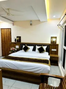 Navarathna Comforts - Chambre