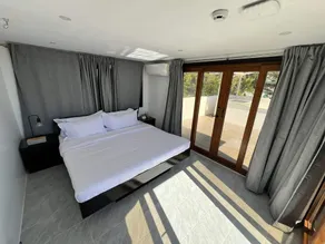 The Pacific Coast Suites - Værelse