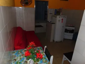 Kitnets com AR Condicionado na Praia - Chambre