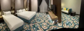 CHRISTEE SUITES HOTEL - Chambre