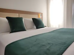 Massimi City Garden Hotel  - Zimmer