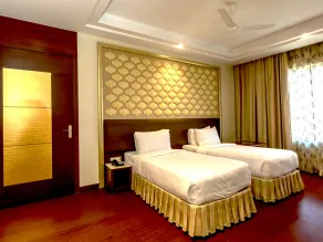 Hotel Kasturi Orchid - Quarto