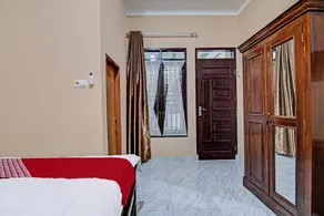 Hotel O Sandira Syariah - Habitación