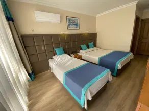 Prima Hotel - Zimmer