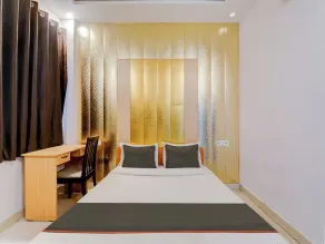 Collection O Kiara Guest House - Quarto