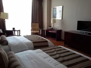 Qingdao Huaxi Hotel - Zimmer