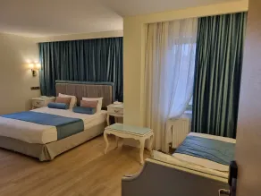 Taximtown Hotel - Chambre