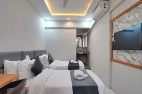 Hotel Palmera Inn - Chambre