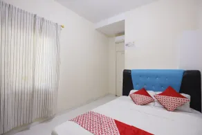 Hotel O Baloi Homestay - Chambre