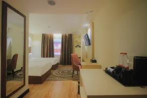 Qin Hotel Banjarbaru - Chambre