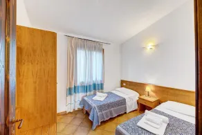 Die fantastische Residenza Badus mit zwei Schlafzimmern bietet Platz für sechs P - Zimmer