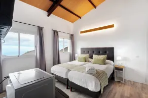 Appartement de vacances 'Casa Lomo El Aire Aceviño' avec vue sur la mer, piscine partagée et Wi-Fi - Chambre