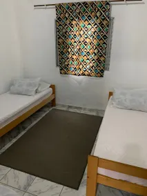 Casa Pé na Areia Guarujá - Habitación