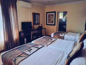 Ecotel Premier Lodge & Conference Centre - Zimmer