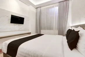 Townhouse OAK Near The Park Mall Semarang Formerly Semarang Boutique Hotel - Room