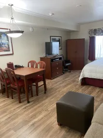 Homestead Lodge Apart Hotel - Chambre
