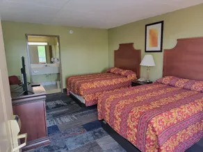 Studio 9 Inn & Suites - Chambre
