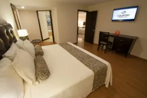 Country Hotel & Suites - Chambre