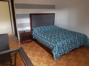 Enriquez Hotel - Chambre